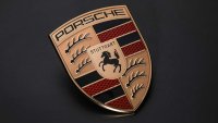 И Porsche си промени емблемата