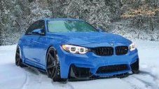 Tesla спаси закъсало на снега BMW M3