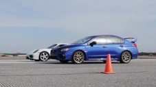 Драг дуел: Cayman срещу WRX STI