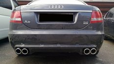 Защо някои автомобили имат двойни изпускателни тръби?