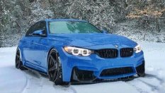Tesla спаси закъсало на снега BMW M3