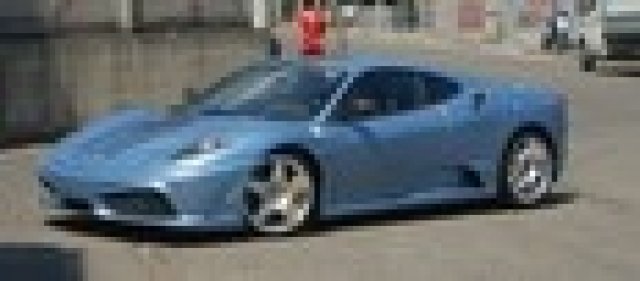 Ferrari F430 Scuderia сниман пред завода в Маранело