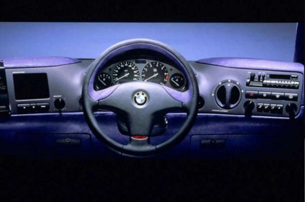 С концепцията Z13 компанията BMW представи пред обществеността и медиите виждането си за това, как си представя градската кола на XXI век. Автомобилът е представен на автосалона в Женева през 1993 година, като е разработен от дизайнера Роберт Пауъл. Самият той признава, че идеята за направата на безопасен, бърз и луксозен градски автомобил е дошла в главата му, докато е пътувал между дома си в Щутгарт и офиса си в Мюнхен в своето BMW 5-Series.

Екипът на Пауъл поставя волана на Z13 в средата на пилотската кабина. Инженерите твърдят, че това решение предпазва водача от странични удари, като същевременно дава възможност за влизане в колата от двете страни. Ако беше достигнал до серийно производство, средно монтираният волан на Z13 щеше да помогне на BMW да спести пари, тъй като нямаше да се налага да прави модели с дясно и ляво кормило.
