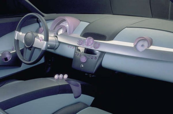 Концепцията Chevrolet Nomdad от 1999 година прави точно обратното - поглежда към миналото. Дизайнерите използват прозрачна пластмаса, за да може интериорът да изглежда визуално по-опростен. Това си остава само концепция, но след няколко години започват да се появяват все повече автомобили с изчистен дизайн на таблото.
