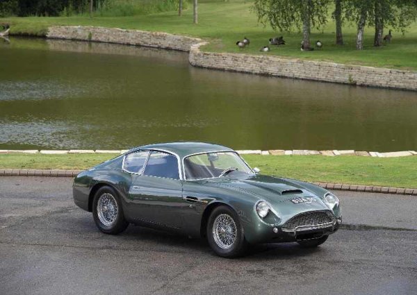 Ерколе Спада прави име в прочутата работилница за каросерии Zagato, където започва през 1960 г. Първият му модел е спортният Aston Martin DB4 GT Zagato, показан за първи път на автомобилното изложение в Лондон през 1960 година. Моделът на практика е DB4 GT, олекотен и подобрен от Спада. Сега такъв Aston Martin струва между 8 и 14 милиона долара и е най-скъпият сериен модел на марката.
