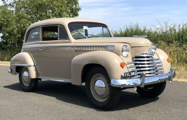 Още преди Втората световна война Opel е вече част от американския гигант General Motors. С американска помощ през 1935 е представен компактният модел Olympia - на практика един от първите масови автомобили в историята със самоносеща конструкция, изпреварен само от Citroen Traction Avant. След войната разрушената от бомбардировки фабрика в Рюселсхайм е построена отново, и Olympia се прави още седем години - от 1947 до 1953, преди да бъде заменена от по-модерната Olympia Record (някъде може да прочетете, че първият Москвич-400 е копие на Olympia, но всъщност съветският модел е изцяло базиран на Opel Kadett K38. А вече Olympia Record е вдъхновението на съветските дизайнери за Москвич-407). В края на 60-те името за кратко е възродено за една луксозна версия на тогавашния Kadett. 
