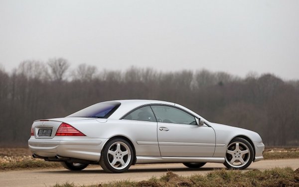 Двигателят с работен обем от 5.8 литра имал само два разпределителни вала, управляващи по 3 клапана на всеки цилиндър. Мощността достигала 367 к.с. и 530 Нм максимален въртящ момент, което било по-малка стойност от това, с което старата W140-ка разполагала. Именно заради това от AMG запретнали ръкави и модифицирали двигателя, представяйки първите в света S 63 и CL 63 AMG модели. Това се случило през 2002, малко преди фейслифтът на S-Class да започне да се оборудва от завода с нов, туин-турбо V12 мотор.
За разлика от модерните 63-ки на AMG, тези коли били задвижвани от атмосферен V12 двигател, базиран на неуспешния дизайн с два разпределителни вала и три клапана на цилиндър. Въпреки това, германските тунинг специалисти успели да изстискат 444 к.с. и 740 Нм максимален въртящ момент.
 