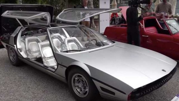 Италианската компания за промишлен дизайн Bertone спира минувачите на автомобилното изложение в Женева през 1967 г. с щурия си прототип Lamborghini Marzal. Сензационен четириместен GT не само открадва шоуто със своите метални сребърни седалки, напълно остъклен покрив и врати с &bdquo;крила на чайка&ldquo;, но също така впечатлява и първото използване на редица от шест продълговати фара.