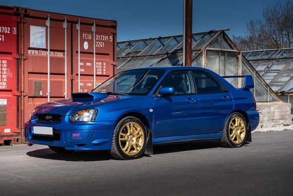 Последен в групата е автомобил, който мнозина наричат &bdquo;най-впечатляващата Impreza, правена някога&ldquo;. Това е WRX STi от фейслифта на модела през 2003 г., когато след редица успехи в ралита, Subaru изоставя кръглите фарове, които подлудяваха феновете по пътя, в полза на по-европейския стил. 

Този автомобил спечели титлата при пилотите във WRC през 2003 г. с Петер Сорберг, което накара Subaru да направи специално версия. Тя се казва Peter Solberg Edition и се радва на огромна почит сред колекционерите.
