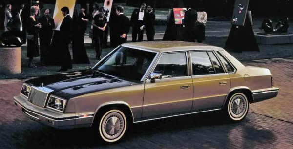 E-Class беше най-малко успешният от моделите, базирани на платформата E-body с предно задвижване от 80-те години. Тясно свързан с New Yorker и Dodge 600, той беше рекламиран като евтин луксозен автомобил. Купувачите на Chrysler не бяха ентусиазирани и обикновено избираха по-скъпия New Yorker с по-богато оборудване.

Продажбите в САЩ бяха толкова разочароващи, че E-класата беше изоставен след 1984 г. (едва втората си моделна година) и преработен като Plymouth Caravelle.