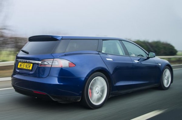 Директорът на английската компания Qwest Фил Хейтън искал комби, за до може да вози любимото си куче. Но, мениджърът разполагал само с американски електрически седан, версия P90D. От компанията приели мераците на шефа си със сърце и започнали работа: сканирали купето на машината с 3D скенер и се заели с конвертирането в комби. Проектът се водел от техническия директор Джим Роутър, който имал дългогодишен опит в моторспорта с Mclaren, Lotus и Tom Walkinshaw Racing.