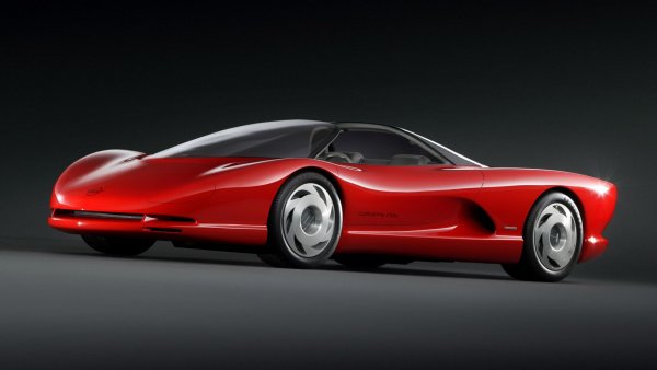 Много преди C8 в Chevrolet са обсъждали идеята да лансират Corvett с двигател пред задния мост. И така предз 1986 на салона в Детройт се появява Corvette Indy Concept.

Концептът получава двигател като на болидите в IndyCar по това време, като мощността му е над 600 конски сили. По-късно обаче, следващите прототипи се задвижват от разработения от Lotus 5,7-литров V8 мотор, който след това стигна до серийно производство с Corvette ZR1.

Corvette Indy е с каросерия от кевлар и карбон, задвижване 4х4 и 4 завиващи колела плюс активно окачване, заето от Lotus. По това време Lotus е собственост на GM и това обяснява тези заемки.
Концептът се развива почти 5 години, като последната версия – CERV III, се появява през 1990 година и има мощност почти 660 конски сили. Но след като става ясно, че серийната версия на колата ще струва над 300 000 долара всичко приключва.