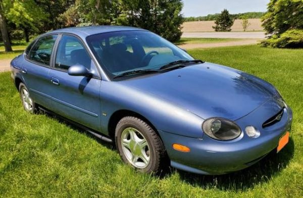 Произведен през 1999, с 3-литров V6 с 24 клапана. Пробег от 150 000 км. Двигателят е в отлично състояние според продавача, интериорът е добре запазен. Колата е в движение, но трансмисията е за ремонт. 
