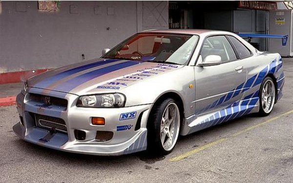 Въпреки че за пръв път се появи във филм, а не в брошура на Nissan, GT-R R34 от "Бързи и яростни" също не може да бъде изключен от подборката. Филмовата поредица създаде собствена автомобилна култура и тази кола изигра голяма роля в това със сребърната си боя и сините ивици.