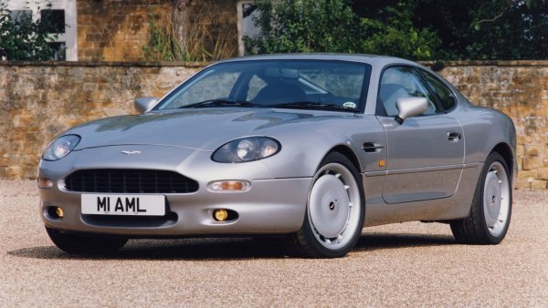 Първоначално Aston Martin DB7 е трябвало да замени Jaguar XJ-S, като по това време двете марки принадлежат към така наречената &bdquo;Premier Automotive Group&ldquo; (PAG) на Ford Group през 1990 г. Дизайнът е на Йън Калъм, като той е направен за 6-цилиндров Jaguar, но в крайна сметка се превръща в DB7.

Колата е представена на автомобилното изложение в Женева през 1993 г., а производството започва година по-късно. Двигателят е 3,4-литров като е тестван по стротите стандарти на Ford. В разработката на колата участва трикратният световен шампион във Формула 1 - сър Джаки Стюарт.
