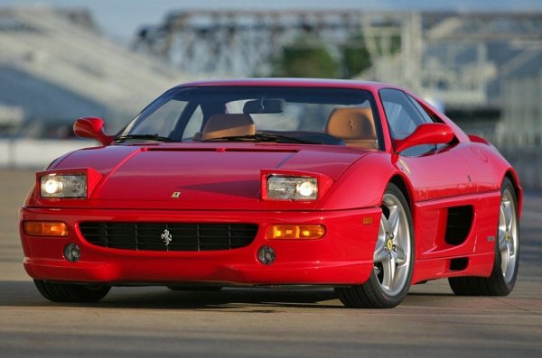 Моделът Berlinetta беше представен за първи път на автомобилното изложение в Женева през 1994 г. Това не беше принципно нова кола, а по същество представляваше дълбоко преработена версия на F348. Насеченият дизайн в духа на легендарното Testarossa е заменен от меки заоблени линии, като автомобилът е сериозно модифициран технически. 
