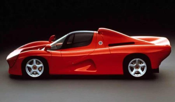 За да не провалят проекта, японците решават да направят суперкола около този V10. Заедно с британското студио International Automotive Design (IAD), Yamaha създава впечатляващия модел OX99-11 със средно разположен двигател, лека конструкция и надлъжно разположени седалки.

Мощността на 3,5-литровия V10 е намалена до 400 к.с. Представена през 1993 г., суперколата преминава през обширни тестове, защото производителят сериозно планира ограничено производство.

След внимателни финансови изчисления обаче, ръководството на компанията решава, че стартирането на производство е твърде рисковано. В резултат на това OX99-11 остава на етап концепция, превръщайки се в един от най-ярките неосъществени проекти на Yamaha.
