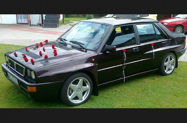 Полякът Бартек Вилк винаги е обичал компактните спортни седани като Subaru Impreza и Mitsubishi Lancer, но пък е искал да има нещо нестандартно. Така в главата му се ражда идеята да превърне Lancia Prisma в четириврата версия а култовата Delta Integrale. И това му се отдава, като във всички случаи тази  Prisma действително прилича на Integrale. 
