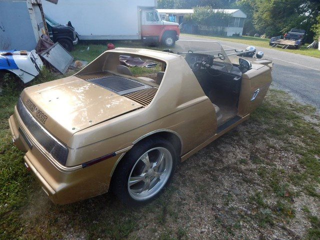Триколка от Pontiac Fiero 